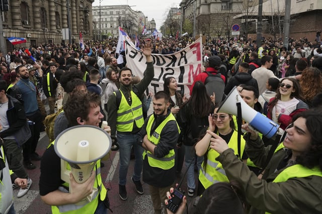 People take part protest rally in Belgrade, Serbia, Monday, March 24, 2025, against a real estate development project that will be financed by the firm of Donald Trump's son-in-law, Jared Kushner, at the site of the former Yugoslav army headquarters destroyed in a U.S.-led NATO bombing campaign in 1999. (AP Photo/Darko Vojinovic)