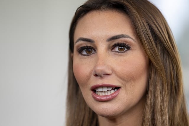Alina Habba, a former defense lawyer for President Donald Trump who has been named interim U.S. Attorney for New Jersey, speaks to members of the media, Monday, March 24, 2025, outside the White House in Washington. (AP Photo/Jacquelyn Martin)