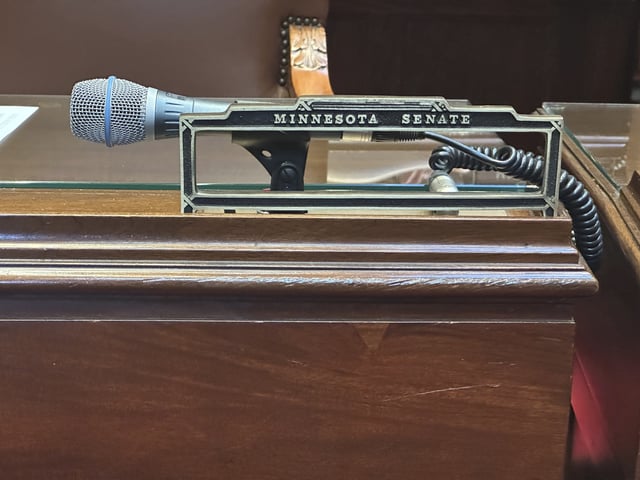 The nameplate stands empty on the desk that belonged to Republican Justin Eichorn, who resigned earlier, Thursday, March 20, 2025, in the Minnesota Senate chamber in the state Capitol in St. Paul, Minn. (AP Photo/Steve Karnowski)