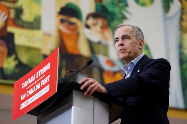 Canada's Prime Minister Mark Carney, on the second day of his Liberal Party election campaign tour, speaks in front of a mural at the Gander International Lounge in Gander, Newfoundland, Canada March 24, 2025. REUTERS/Blair Gable