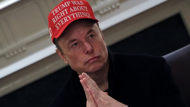 Tesla CEO Elon Musk wears a &#39;Trump Was Right About Everything!&#39; hat while attending a cabinet meeting at the White House in Washington, D.C., on March 24, 2025.