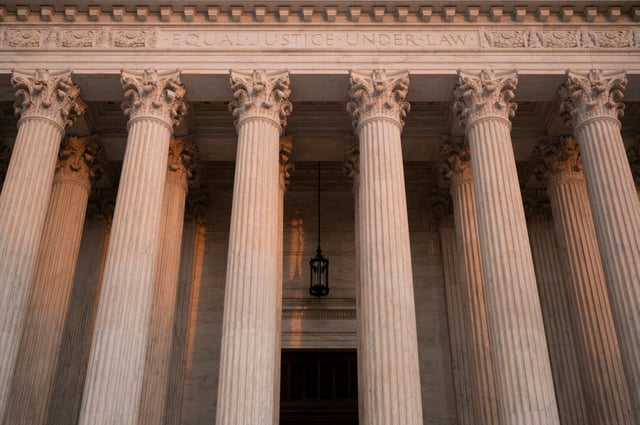 The Supreme Court building is seen at sunset in Washington.