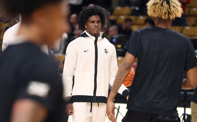 UCF guard Jaylin Sellers watches teammates warm up before the Colorado at UCF NCAA basketball game in Orlando on Wednesday, January 8, 2025. (Stephen M. Dowell/Orlando Sentinel)