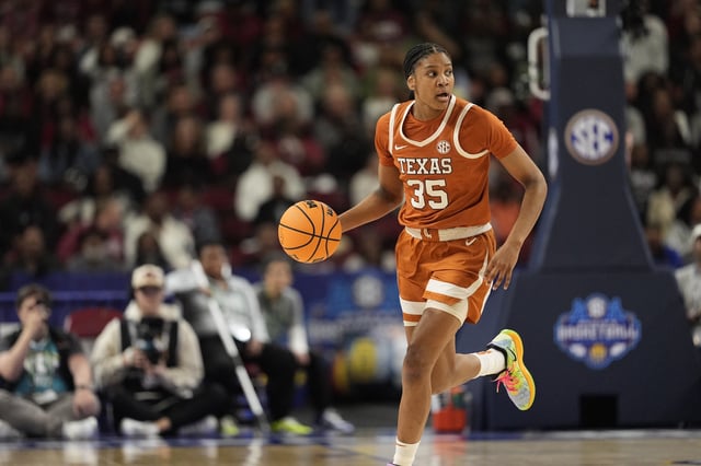 March 9, 2025; Greenville, SC, USA; Texas Longhorns forward Madison Booker (35) brings the ball up court against South Carolina Gamecocks during the first half at Bon Secours Wellness Arena. Mandatory Credit: Jim Dedmon-Imagn Images/File Photo