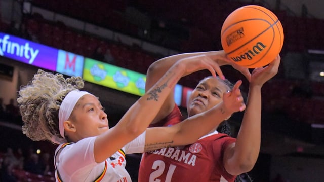 Alabama Crimson Tide forward Essence Cody battles Maryland Terrapins guard Kaylene Smikle for a rebound on her missed layup during the 2025 NCAA Division I women&#39;s basketball tournament second round in College Park. (Karl Merton Ferron/Staff)