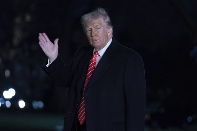 President Donald Trump waves to the media as he walks on the South Lawn of the White House, in Washington, Saturday, March 22, 2025. (AP Photo/Jose Luis Magana)