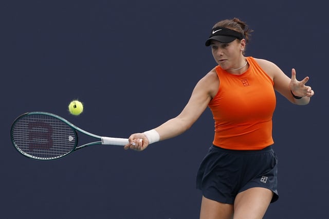 Mar 24, 2025; Miami, FL, USA; Amanda Anisimova (USA) hits a forehand against Emma Raducanu (GBR)(not pictured) on day seven of the Miami Open at Hard Rock Stadium. Mandatory Credit: Geoff Burke-Imagn Images