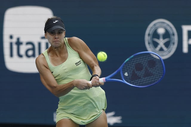 Mar 24, 2025; Miami, FL, USA; Magna Linette (POL) hits a backhand against Coco Gauff (USA)(not pictured) on day seven of the Miami Open at Hard Rock Stadium. Mandatory Credit: Geoff Burke-Imagn Images