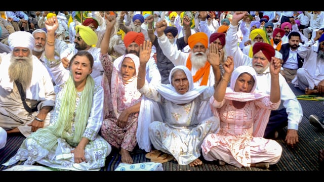 Jaswinder Kaur, wife of Colonel Pushpinder Bath, with others during a protest outside Mini Secretariat in Patiala on Monday. (PTI)