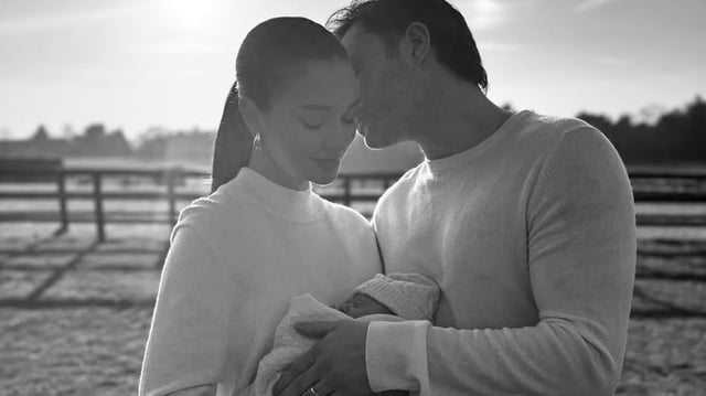 Amy Jackson and Ed Westwick with their newborn.