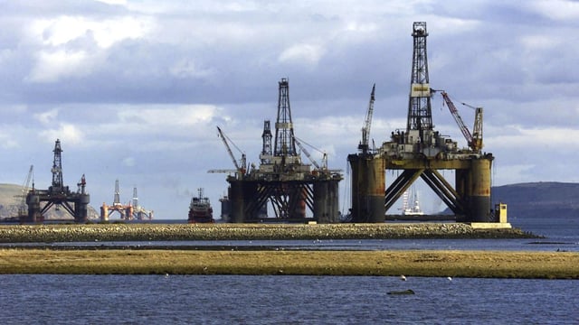 North sea oil exploration platforms lie idle in the Cromarty Firth in northern Scotland.
(Martin Cleaver/AP)