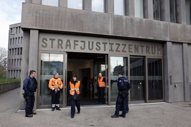 Police officers are seen as former FIFA President Sepp Blatter and former UEFA President Michel Platini arrive at the tribunal for their verdict on corruption charges in Muttenz, March 25, 2025. REUTERS/Stefan Wermuth