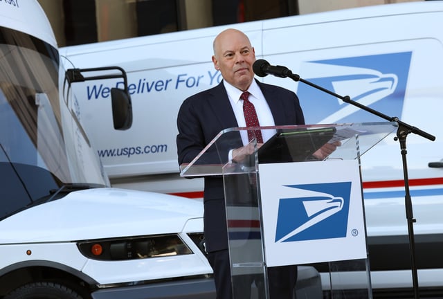 Louis DeJoy, who stepped down this week as U.S. Postmaster General, delivers a speech at the Postal Service Headquarters on December 20, 2022, in Washington, DC.