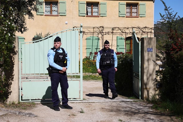 Gendarmes stand outside the house of the grandparents of Emile Solei in La Bouilladisse, southeastern France, on March 25, 2025.
