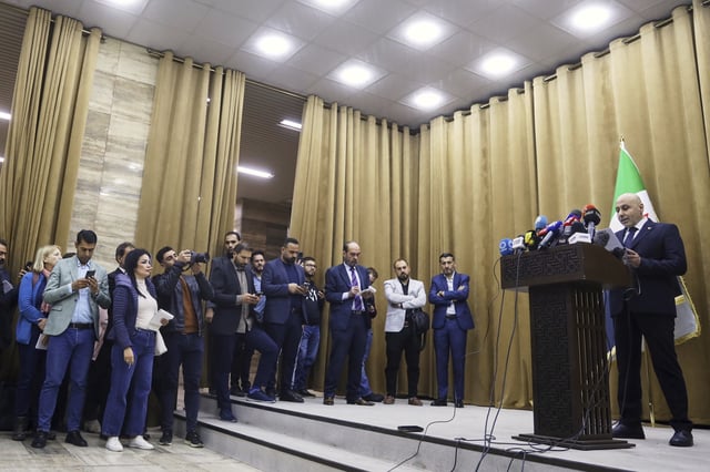 Yasser Farhan, a member of the fact-finding committee investigating sectarian killings during recent clashes between rival groups in an insurgency led by Bashar al-Assad loyalists in Syria's coastal region, holds a press conference in Damascus, Syria, Tuesday, March 25, 2025. (AP Photo/Omar Albam)