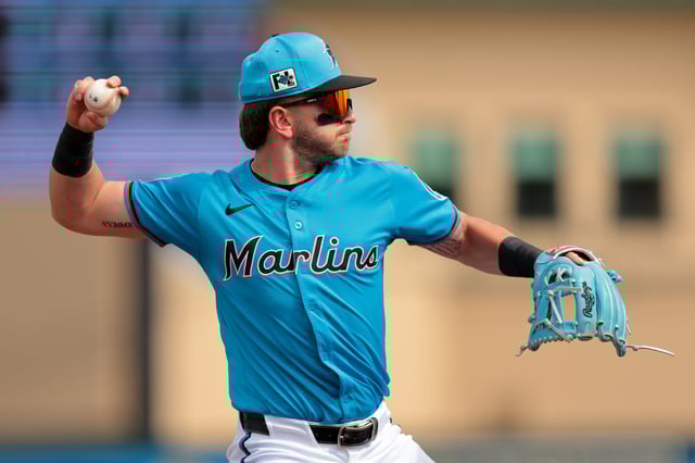 Feb 26, 2025; Jupiter, Florida, USA; Miami Marlins third baseman Connor Norby (1) throws to first base and retires New York Mets designated hitter Chris Williams (not pictured) during the third inning at Roger Dean Chevrolet Stadium. Mandatory Credit: Sam Navarro-Imagn Images/File Photo