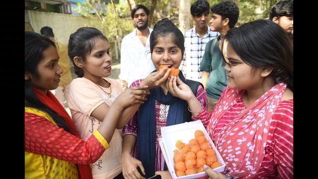 Students celebrating after the Bihar Board Class 12 examination results, at Mahant Hanuman Sharan College in Patna, on Tuesday. (Santosh Kumar/HT)