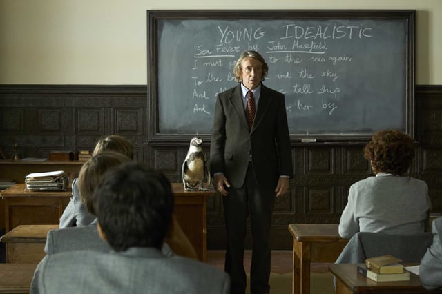 Baba/Richard the penguins as Juan Salvador, left, and Steve Coogan as Tom Michell in “The Penguin Lessons.”
