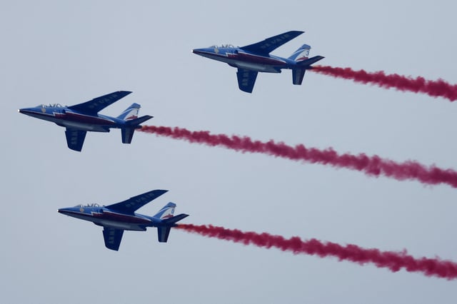 French Air Force elite acrobatic flying team &#34;Patrouille de France&#34; flies over the Seine River during the opening ceremony for the 2024 Summer Olympics in Paris, France, Friday, July 26, 2024.