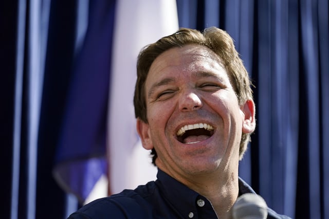 Republican presidential candidate Florida Gov. Ron DeSantis laughs during a Fair-Side Chat at the Iowa State Fair, Saturday, Aug. 12, 2023, in Des Moines, Iowa.