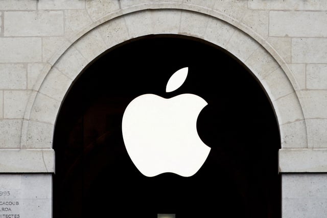 Apple logo is seen on the Apple store at The Marche Saint Germain in Paris, France July 15, 2020.  REUTERS/Gonzalo Fuentes/File Photo