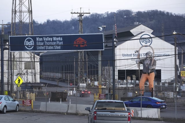 Cars sit parked outside the United States Steel Corporations Edgar Thomson Plant in Braddock, Pa., on Tuesday, March 4, 2025, in Braddock, Pa. (AP Photo/Gene J. Puskar)