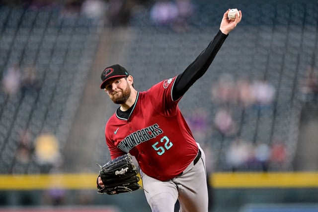 DENVER, COLORADO - SEPTEMBER 17: Jordan Montgomery #52 of the Arizona Diamondbacks pitches in the first inning against the Colorado Rockies at Coors Field on September 17, 2024 in Denver, Colorado.