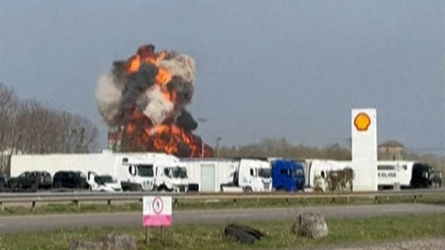 One of the Alpha Jets explodes in a ball of flame. No one on the ground was hurt in the incident