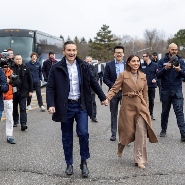 Conservative Party of Canada leader Pierre Poilievre with his wife Anaida in Richmond Hill Ont. on March 25, 2025.