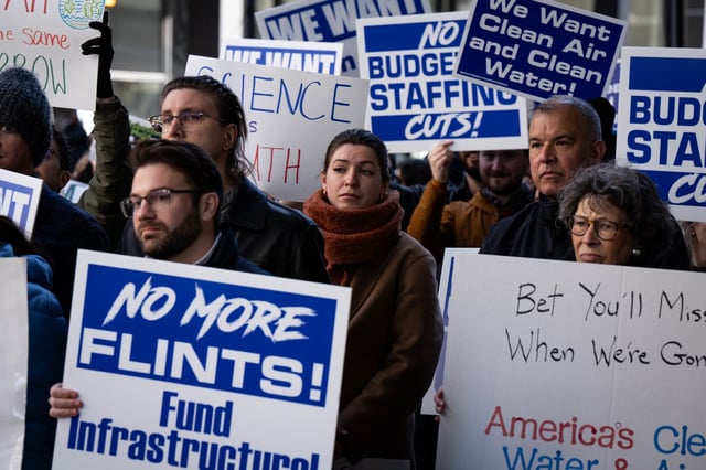Environmental Protection Agency employees from the Chicago area rally against attacks on the agency by the Trump administration, outside the Metcalfe Federal Building, March 25, 2025.   (E. Jason Wambsgans/Chicago Tribune)
