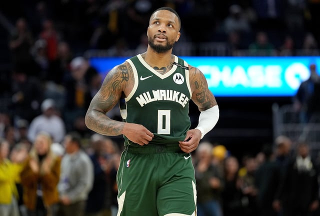 Damian Lillard #0 of the Milwaukee Bucks reacts untucking his jersey after the Golden State Warriors defeated the Bucks 104-93 at Chase Center on March 18, 2025 in San Francisco, California.