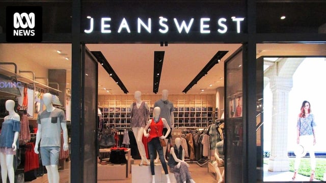 The front of a Jeanswest store with mannequins in the windows.