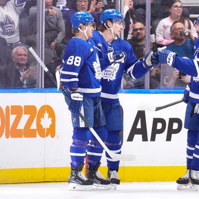 Toronto Maple Leafs' William Nylander (88) celebrates scoring with Matthew Knies (23) and Auston Matthews (34) against the Philadelphia Flyers during first period NHL hockey action in Toronto, on Tuesday, March 25, 2025. THE CANADIAN PRESS/Chris Young