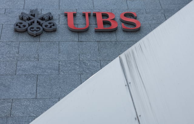 A UBS logo is pictured on the branch of the Swiss bank in Lucerne, Switzerland, June 14, 2024.  REUTERS/Denis Balibouse/File Photo