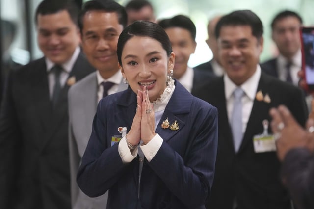 Thailand's Prime Minister Paetongtarn Shinawatra arrives at parliament before no-confidence vote against her in Bangkok, Thailand, Wednesday, March 26, 2025. (AP Photo/Sakchai Lalit)