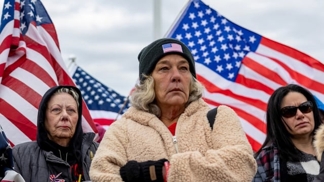 Micki Witthoeft, mother of Ashli Babbitt, stands with supporters of protesters that were arrested on Jan 6, 2021