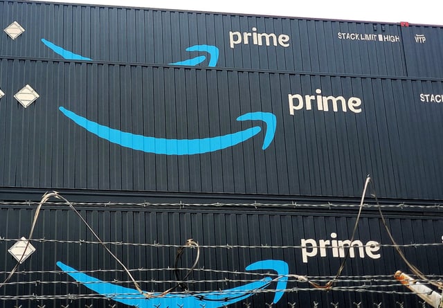 Amazon Prime shipping containers stack up at the Port of Seattle in advance of the 2021 holiday season. (GeekWire Photo / Todd Bishop)