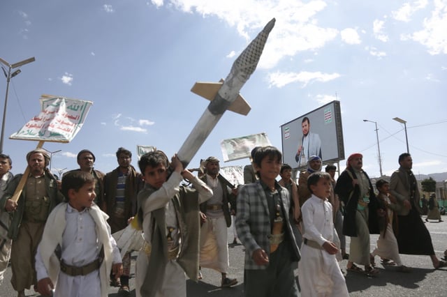 Yemeni children participate in a demonstration last week following aerial attacks by the U.S. targeting territory held by Houthi rebels.