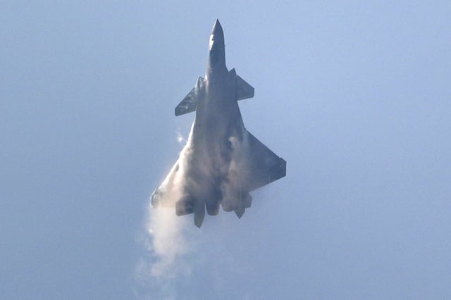 A Chinese J-20 stealth fighter jet performs during the 15th China International Aviation and Aerospace Exhibition at Zhuhai in southern China&#39;s Guangdong province on November 12, 2024.