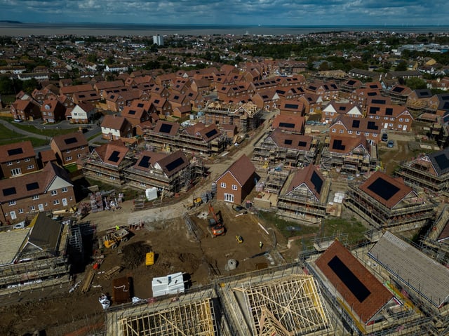 A drone view shows construction work taking place on new homes at Whitstable Heights a new housing development, as the UK government aims to build 1.5 million new homes, in Whitstable, Britain, September 11, 2024. REUTERS/Chris J. Ratcliffe/File Photo