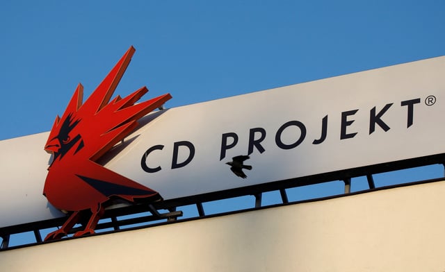 A bird flies in front of the Cd Projekt logo at its headquarters in Warsaw, Poland January 21, 2020. Picture taken January 21, 2020. REUTERS/Kacper Pempel/File Photo