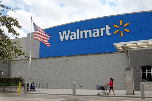 A customer leaves a Walmart store on January 24, 2023 in Miami, Florida.