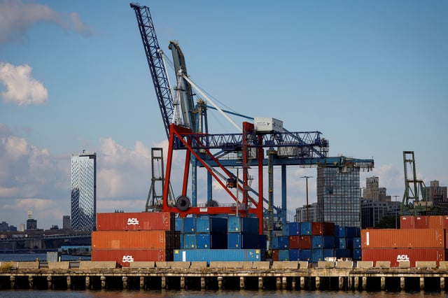Shipping containers are stacked on a pier at the Red Hook Terminal in Brooklyn, New York, U.S., September 20, 2024. REUTERS/Brendan McDermid/File Photo