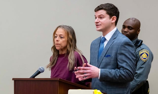Kimberly Sullivan stands next to her attorney Jason Spilka during a bond hearing Thursday, March 13, 2025 at Waterbury Superior Court.