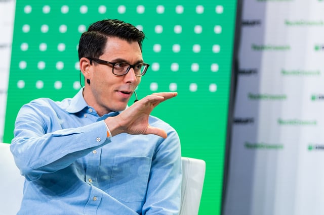 RJ Scaringe, CEO at Rivian, on the TechCrunch Disrupt stage in San Francisco on October 19, 2022. Image Credit: Haje Kamps / TechCrunch