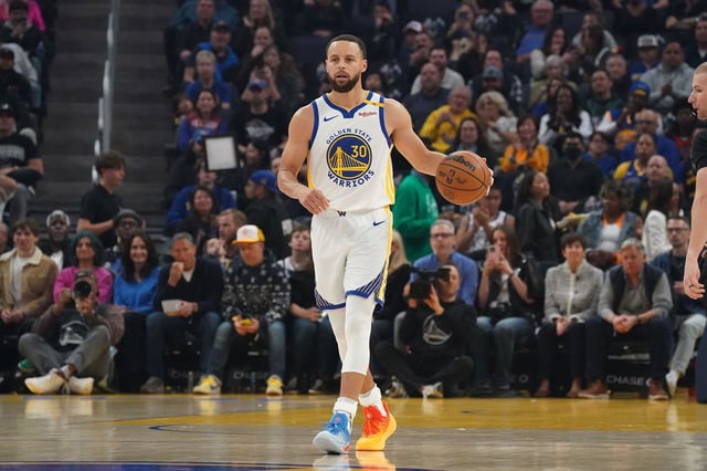 Mar 8, 2025; San Francisco, California, USA; Golden State Warriors guard Stephen Curry (30) dribbles the ball up court in the first quarter against the Detroit Pistons at Chase Center.