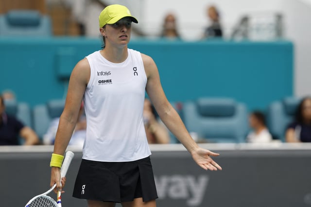 Mar 23, 2025; Miami, FL, USA; Iga Swiatek (POL) gestures toward her box after missing a shot against Elise Mertens (BEL)(not pictured) on day six of the Miami Open at Hard Rock Stadium. Mandatory Credit: Geoff Burke-Imagn Images/File Photo