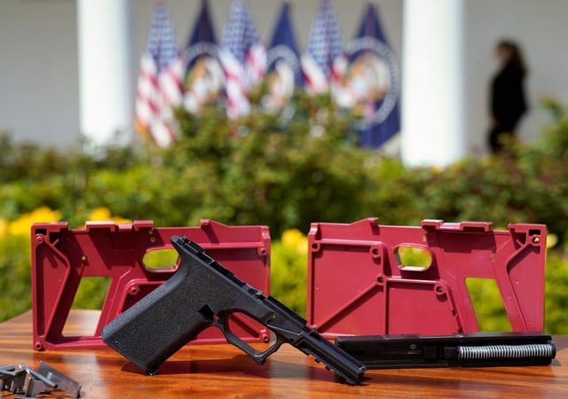 Parts of a ghost gun kit are on display at an event held by U.S. President Joe Biden to announce measures to fight ghost gun crime, at the White House in  Washington U.S., April 11, 2022. REUTERS/Kevin Lamarque/File Photo