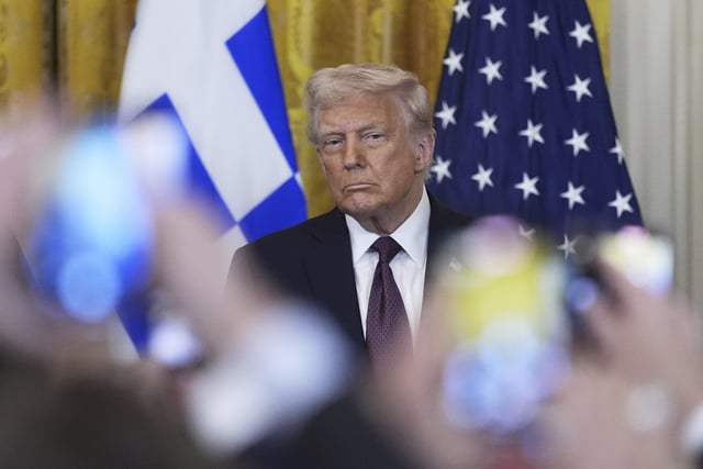 President Donald Trump attends a reception celebrating Greek Independence Day in the East Room of the White House, Monday, March 24, 2025, in Washington.