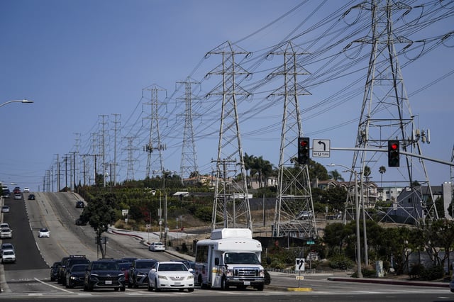 FILE - Power transmission towers line a street in Redondo Beach, Calif., Wednesday, Sept. 7, 2022. (AP Photo/Jae C. Hong, File)